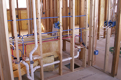 Plumbing in the frame of a newly built house